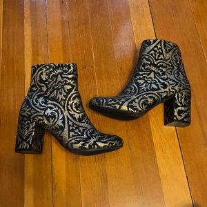 Gold detailed ankle boots